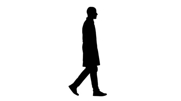 Beyaz cüppeli siluet Arap doktor yürüyor. — Stok fotoğraf