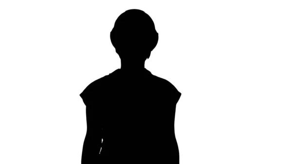 Silhouette Junge Frau mit gelbem Bollenhut. — Stockfoto