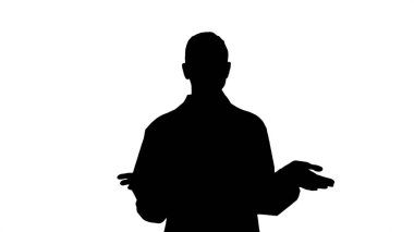 Siluet Çekici doktor yan tarafı işaret ederek profesyonel sunar