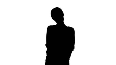 Siluet Genç, gülümseyen bir kadın selamlaşmak için elini sallıyor.