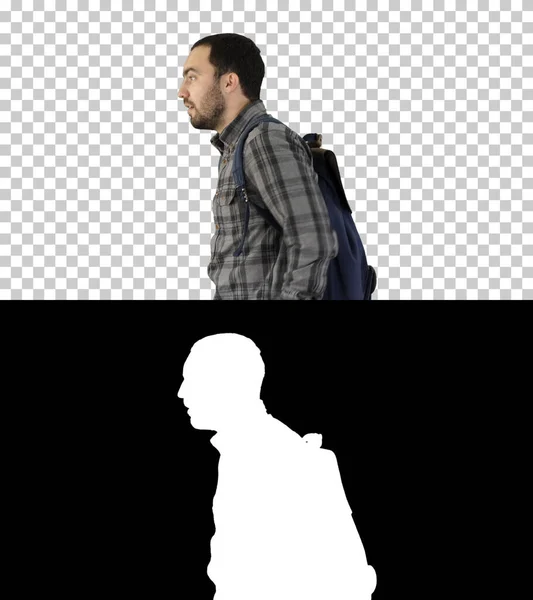 Portrait of man putting backpack on, Alpha Channel