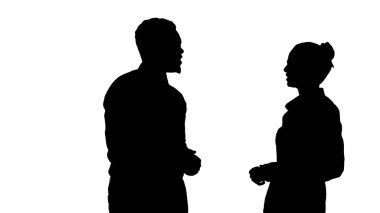 Siluet Afro-Amerikan erkek ve kız iş hakkında konuşuyor..