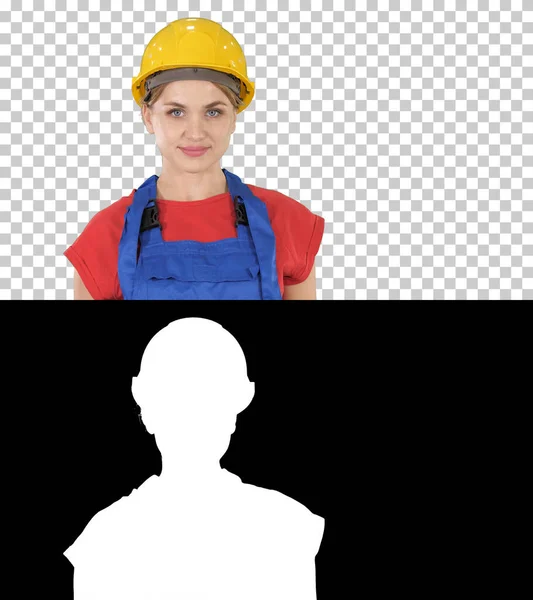 Sorrindo construtor trabalhador mulher de pé e mudando poses Fol — Fotografia de Stock