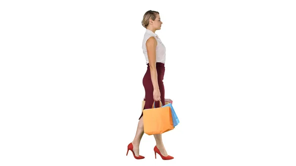 Feliz mujer de cuerpo entero sosteniendo bolsas de compras de papel en cada han —  Fotos de Stock