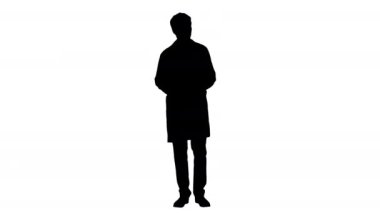 Siluet erkek doktor kamerayla konuşuyor bir şey anlatıyor..