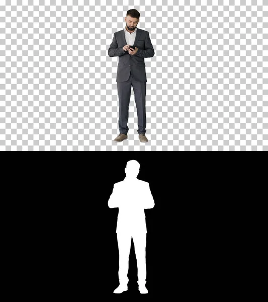 Turk affärsman messar på sin telefon, Alpha Channel med Silho — Stockfoto