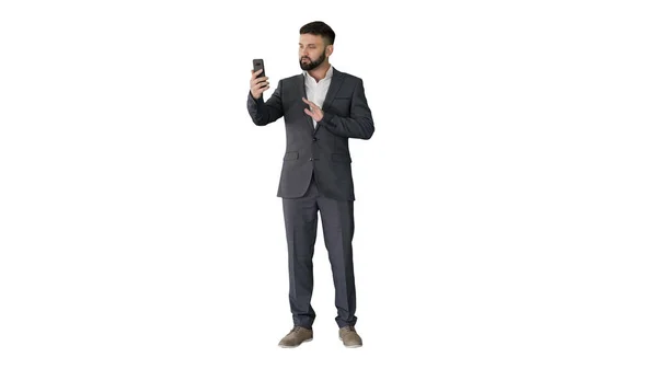 Hombre de negocios turco guapo haciendo una videollamada con su smarphon — Foto de Stock