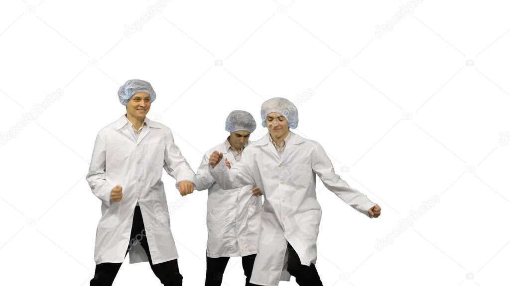 Three male doctors in white robes and protective caps running in