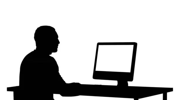 Silhouette Man typing on the computer. — Stock Photo, Image