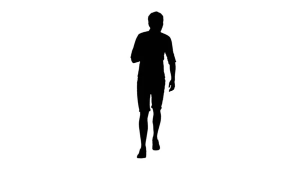 Silhouette Exhausted young man suffering from heat while walking — Stock Photo, Image