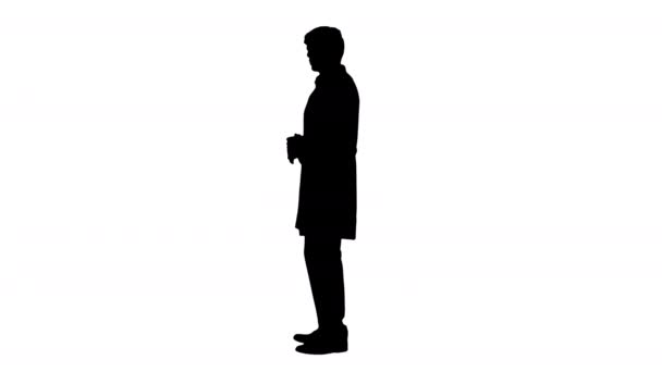 Silhouette Doctor wearing white coat explaining something. — Stock Video