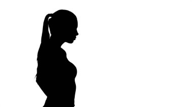 Siluet zarif kıyafetli güzel genç bayan, tutun.