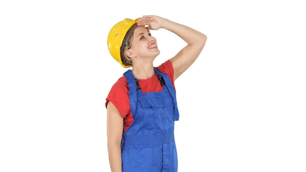 Engineer construction worker woman looking up at something amazi — Stock Photo, Image