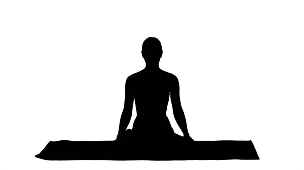 Silhouette Sporty atrakcyjna kobieta ćwiczy jogę, siedzi w L — Zdjęcie stockowe