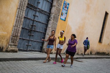 HABANA, CUBA-JANUARY 13: People in the city street on January 13, 2018 in Habana, Cuba. People in the city street clipart