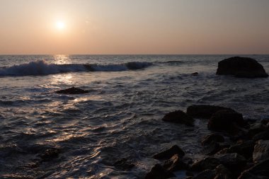 Gün batımında Hint Okyanusu. Varkala. Kerala. Hindistan