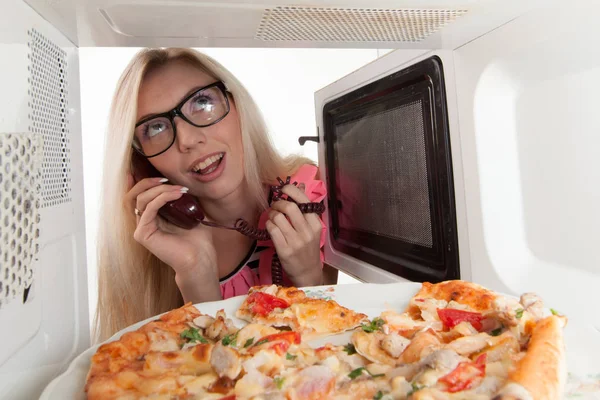 Attractive Girl Opening Microwave — Stock Photo, Image