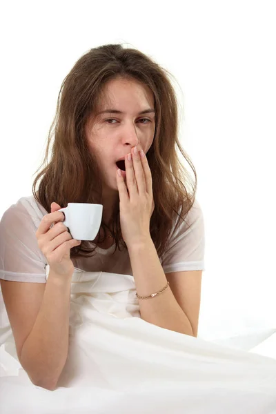 Young Woman Sitting Bed Cup Coffee Yawn Stock Picture
