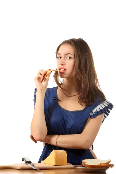 Young Girl Dressed Apron Eating Cheese — Stock Photo, Image