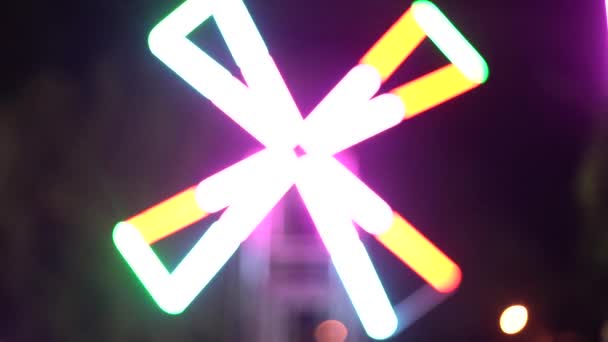 Arrière-plan : filature lumineuse multicolore. abstrait multicolore sans couture boucle néon fond lumineux tourbillonnant Cercles lumineux — Video