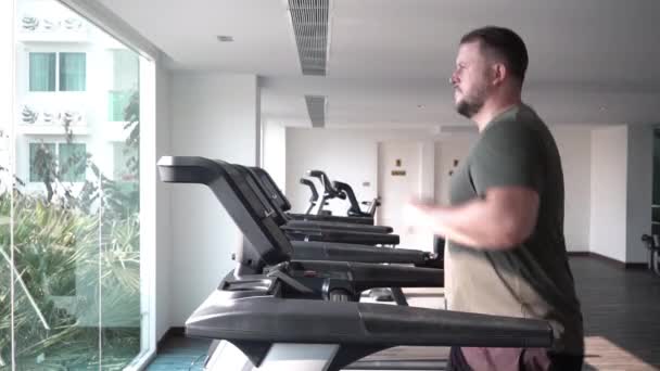 Sweating Chubby Man Walking Running Track Warming Gym Treadmill — Stock Video