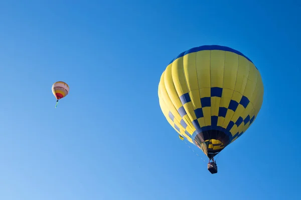 Hot air balloons in the blue summer sky