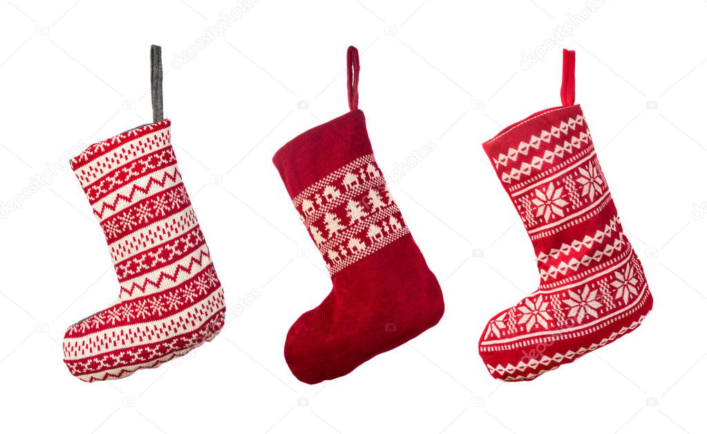 Red Christmas stocking isolated over white background