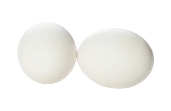 Два белых яйца — стоковое фото
