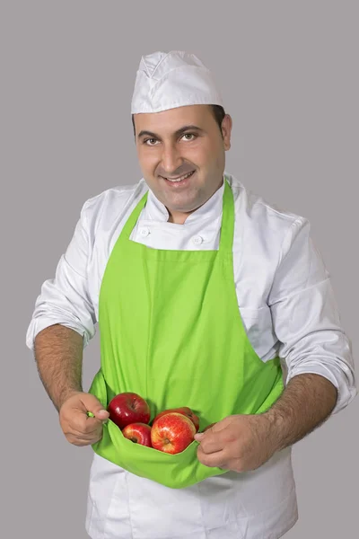 Vendedor Frutas Con Varias Manzanas Rojas Delantal Verde —  Fotos de Stock