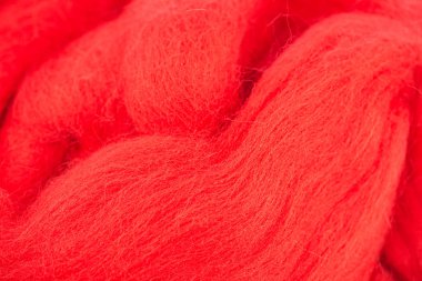 Koyun yün lifleri, doku arka plan ekran koruyucu için. Skein yün, cordos, merinos yün. Rengi kırmızı arka plan ekranda, yakın çekim