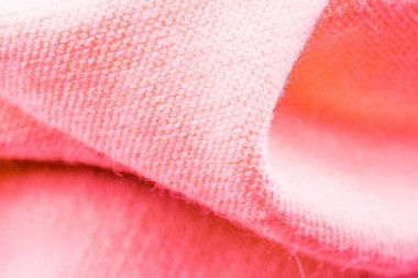 Örgü kumaş kazak üzerine arka plan kafa bandı, closeup doku. Şeftali rengi