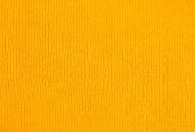 Bağlama, pigtails dikey olarak, yakın çekim arka plan doku. Doymuş sarı, sıcak rengidir