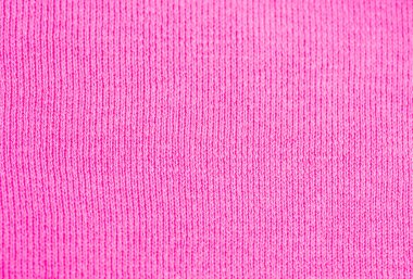 Doku örme, dikey olarak, yakın çekim, arka plan ekran koruyucu örgü. Parlak pembe renktedir