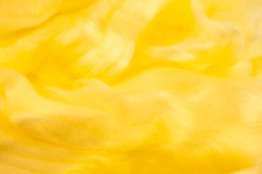 Bulanık renkli arka planlar. İnci inci sarı doku. Yün iplikler. Arka plan koruyucu ev. Sarı arka plan