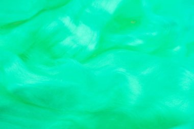 Bulanık renkli arka planlar. Yün annesi inci'nin dokusu parlak turkuaz var. Yün iplikler. Arka plan koruyucu ev. Parlak turkuaz arka plan