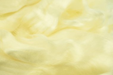 Bulanık renkli arka planlar. Yün inci hafif limon taşma ile doku. Yün iplikler. Arka plan koruyucu ev. Taşma arka plan ile hafif limon