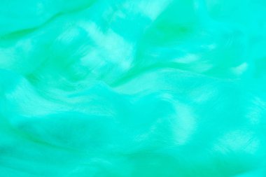 Bulanık renkli arka planlar. Yün inci parlak nane doku. Yün iplikler. Arka plan koruyucu ev. Parlak nane arka plan