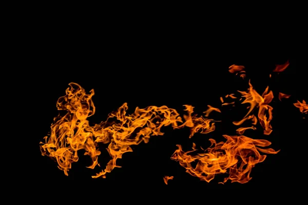 Φλόγες φωτιάς σε μαύρο φόντο. πυρκαγιά σε μαύρο φόντο απομονώθηκε. μοτίβα πυρκαγιάς — Φωτογραφία Αρχείου