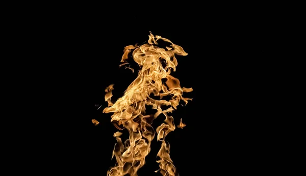 Llamas de fuego sobre fondo negro. fuego sobre fondo negro isolat — Foto de Stock