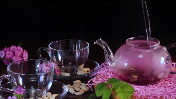 Pour Boiling Water Teapot Tea Leaves Red Hot Hibiscus Tea — Stock Video