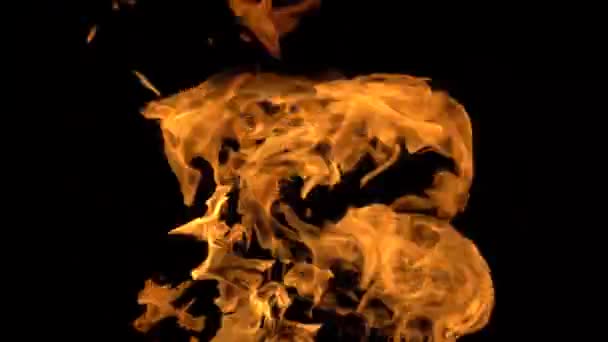 火災や炎の4Kビデオ 火災ピット 燃焼ガスやガソリン火災や炎で燃焼 炎や燃焼火花クローズアップ 火災パターン コピースペースと暗闇の中で火災の地獄の輝き — ストック動画