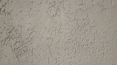 Eski kahverengi alçı duvar dokusu. doğal çimento veya taş eski doku malzemesi Vintage kahverengi arka plan, ürün veya arka plan için.