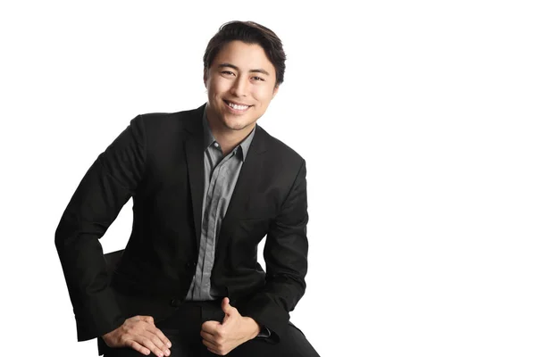 Handsome Asian Businessman Smiles Camera Sitting Gives Thumbs Wearing Black — Stock Photo, Image