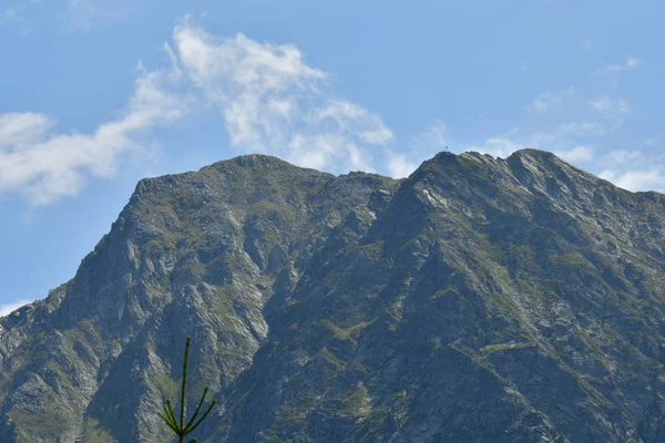 summit rock in the Clouds of the mountains in south tyrol italy europe Clouds fog