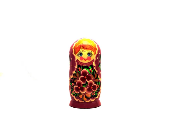 Russian folk toys matryoshka doll. Matryoshka on a white background isolated