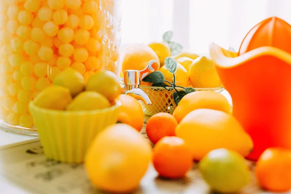 Bright yellow and orange fruits. Lemonade stand