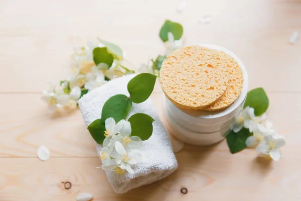 Aroma Spa concept with jasmine flowers on a white wooden background, health care and spa — Stock Photo, Image