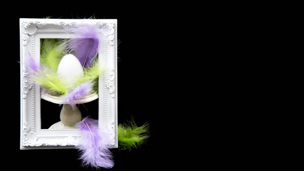White Easter Egg Green Purple Feathers White Picture Frame — Stock Photo, Image