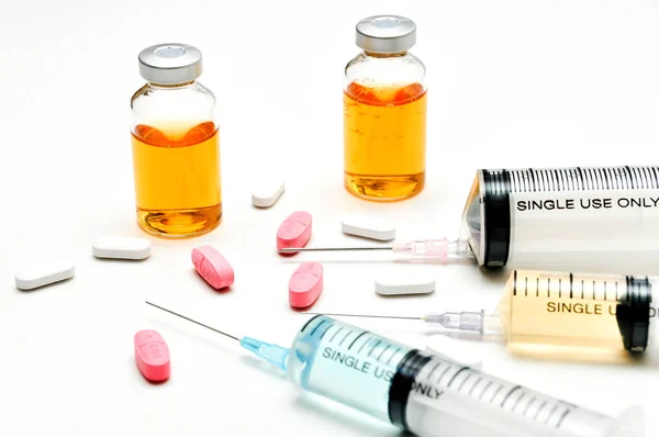Vaccine / hypodermic syringe / needle / Pills