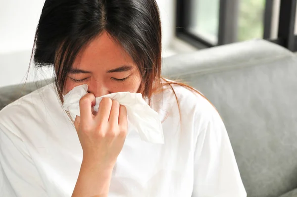 Young Asian woman got sick and flu